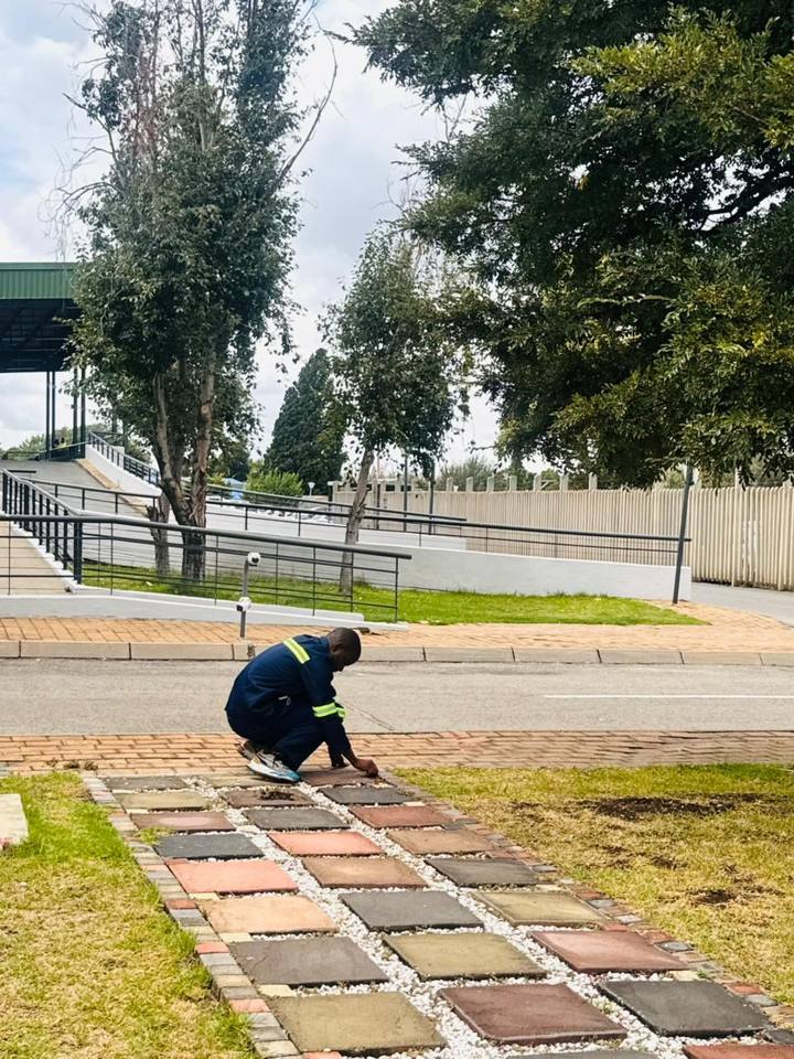 Fresh Lavation horticulture team with leaf blower at commercial property